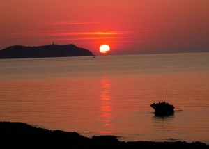 Sunset across Port des Torrent, San Antonio Bay